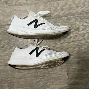 White New Balance tennis shoes